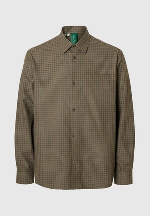 Ruda languota ilgomis rankovėmis marška su apkaulinta apykakle, turi krūtinės kišenę ir rudus sagas. Pagaminta iš lengvos medžiagos.