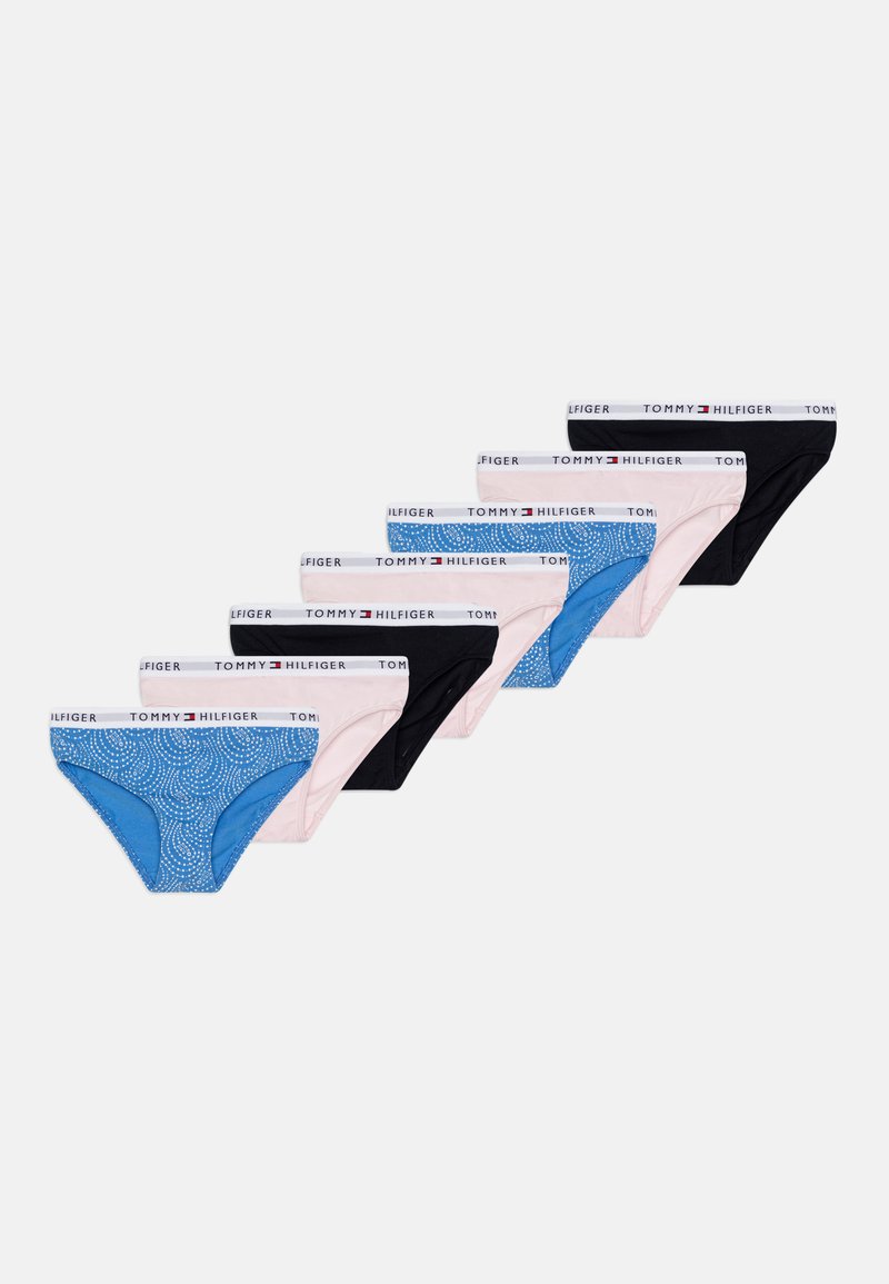 Seven pairs of Tommy Hilfiger women's briefs in black, pink, and blue with a dotted pattern, featuring logoed elastic waistbands.