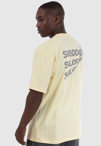 Smilodox MALIN żółty