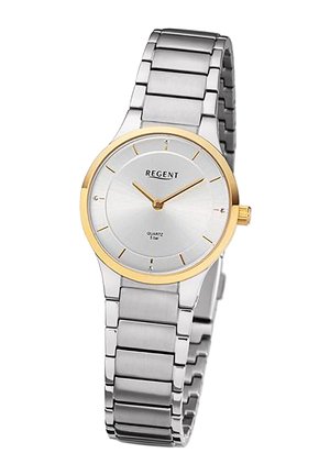 Montre en acier inoxydable argenté avec une lunette dorée, un cadran argent clair, des marqueurs d'heure minimalistes et un mouvement à quartz.