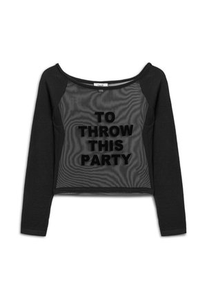 Sweat-shirt noir court avec un devant en maille, orné d'une inscription en lettres noires audacieuses qui dit « ORGANISER CETTE FÊTE ». Manches longues.