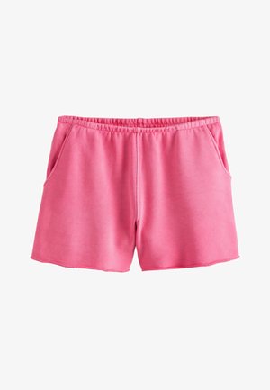 Bermudas de algodón rosa con cintura elástica, que cuentan con bolsillos laterales y un dobladillo sin rematar. La tela tiene una textura suave y lisa.