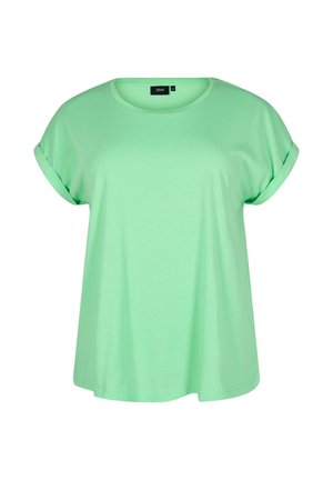 Majica s kratkim rukavima i okruglim izrezom u svijetlozelenom pamuku. Ima podvrnute rukave i opušteni kroj. Oznaka vidljiva na izrezu.