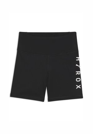 Czarne sportowe szorty z wysokim stanem, z logo "PUMA" oraz tekstem "ROX" nadrukowanym pionowo na białym pasku na prawej udzie.