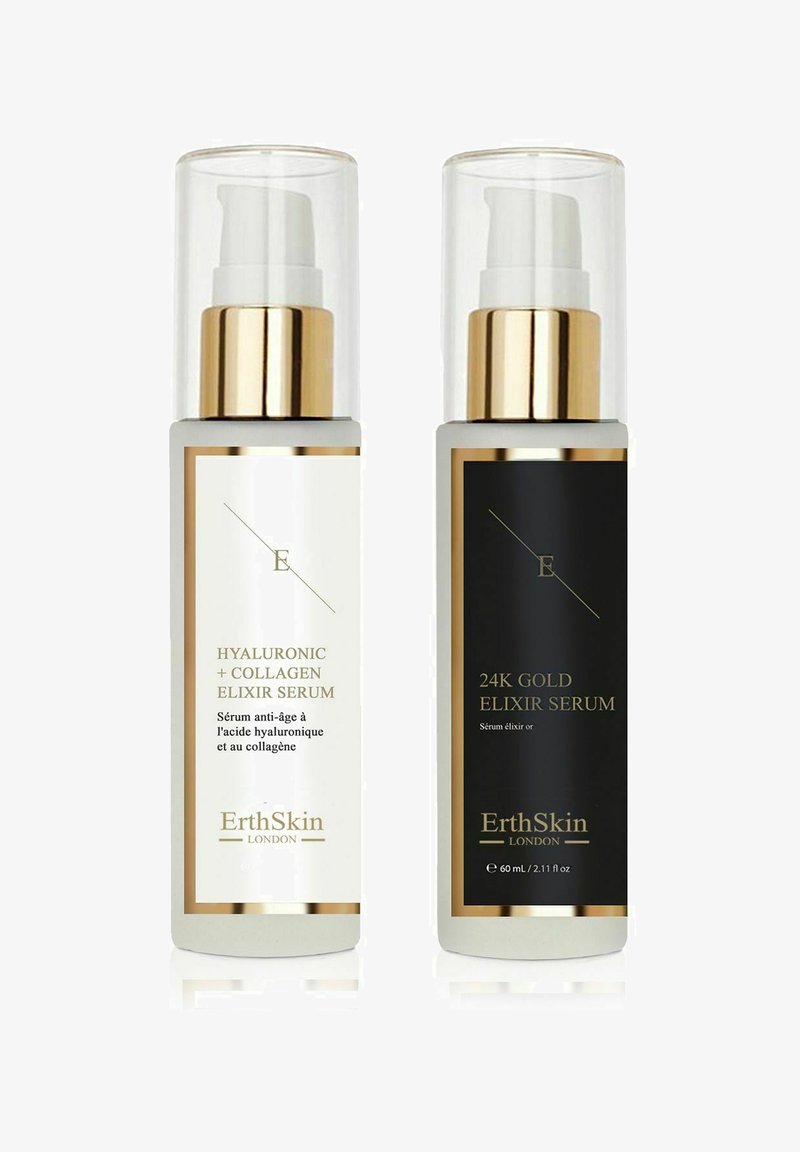 Dwie butelki serum obok siebie. Po lewej: biały etykieta, złote akcenty. Po prawej: czarna etykieta, złote akcenty. Obie z przezroczystymi pompkami, 60 ml każda.