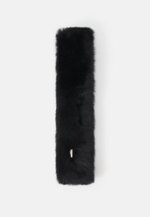 Black faux fur accessory, elongated rectangular shape, soft texture, featuring a small silver hardware detail for attachment.
