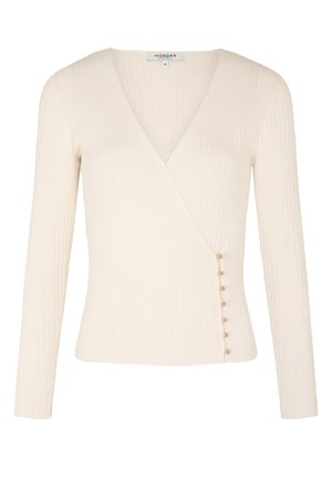 Top blanco de manga larga con canalé y escote en forma de V, que presenta un detalle de botones en un lado. Fabricado con un tejido texturizado para un estilo ajustado.