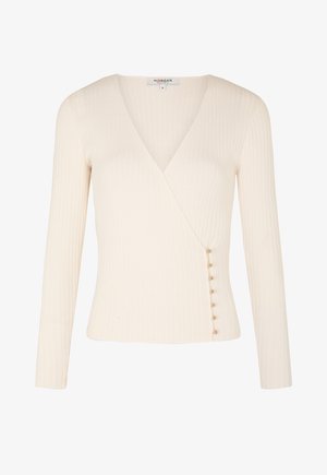 Maglietta bianca a manica lunga con scollo a V, caratterizzata da un dettaglio a bottoni su un lato. Realizzata in un tessuto texturizzato per uno stile aderente.