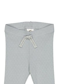 Lichtgrijze katoen broeken met een textuurpatroon, voorzien van een gebreide taille en een verstelbaar trekkoord. Vloeiende stof zonder extra accenten.