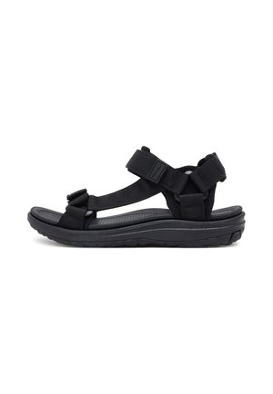Czarne sandały z regulowanymi paskami, teksturowaną wkładką i gumową podeszwą. Posiadają profilowany kształt zapewniający komfort i stabilność.