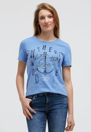 Light blue cotton t-shirt with short sleeves, featuring a dark graphic print with text and an anchor design. Round neckline, casual fit.