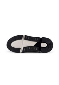 Black shoe sole with a textured grip, featuring a white midsole and a logo at the heel. Multiple grooves and indentations for traction.