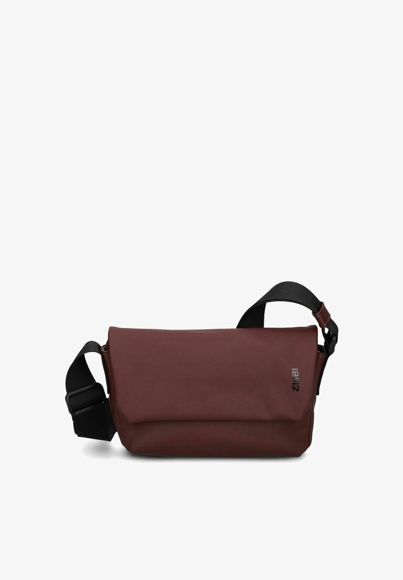 Brown, rectangular crossbody bag made of durable material, featuring a flap closure and an adjustable strap. Minimalist design with logo detail.