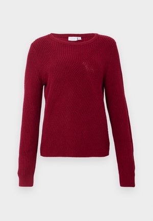 Red knitted sweater with long sleeves, round neck, and textured diagonal patterns. Ribbed cuffs and hem detail.