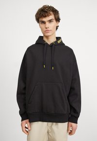 Calvin Klein - GRID LOGO MODERN COMFORT HOODIE - Mikina - black Miniatura obrázku 1