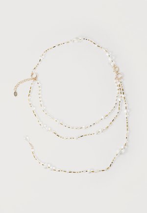 Delicate double-layer necklace with small gold rectangular beads and clear round beads, featuring gold clasps and an adjustable chain extender.