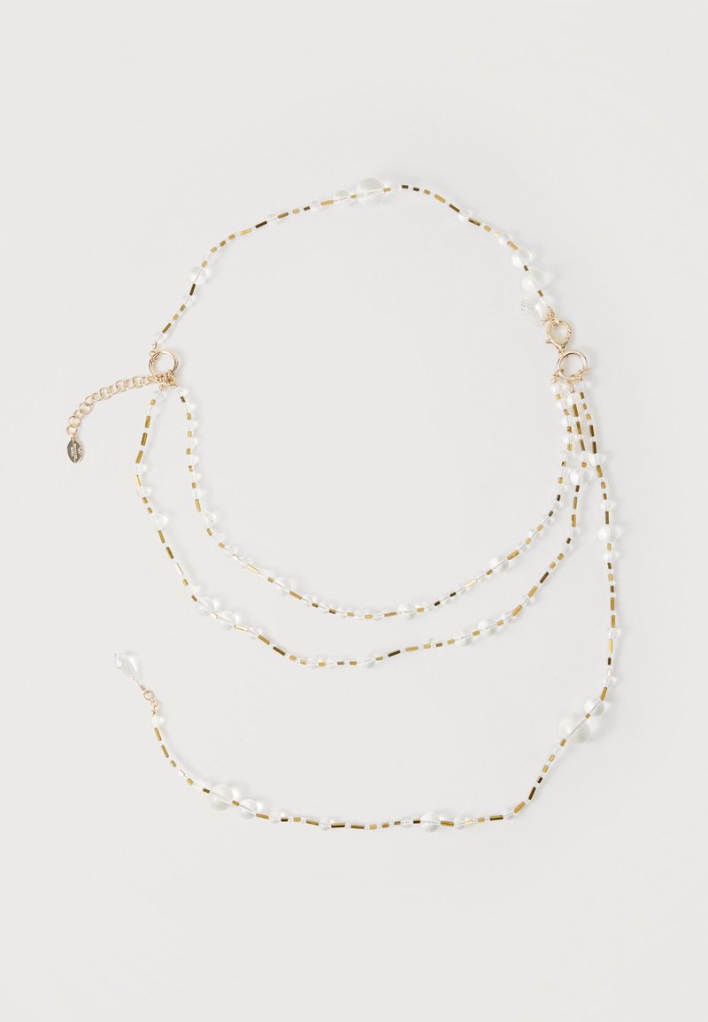 Λεπτό διπλό κολιέ με μικρές χρυσές ορθογώνιες χάντρες και διάφανα στρογγυλά στοιχεία, με χρυσά κούμπωμα και ρυθμιζόμενο επιμήκη αλυσίδα.