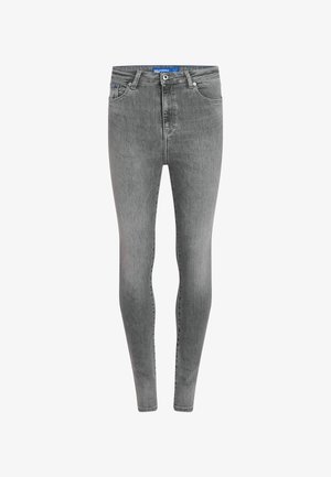 Slim-fit, vysokým pasem džíny ve světle šedém denimu. Disponují pěti kapsami, kovovým zapínáním na knoflík a jemnými vybledlými detaily po stranách nohavic.