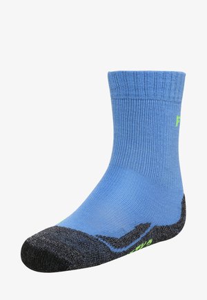 Blauwe sok gemaakt van een zachte, geribbelde stof. Heeft een donkergrijze teen en hiel, met een groen accentlogo aan de zijkant.