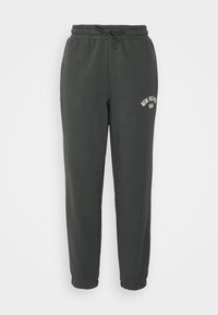 New Balance ESSENTIALS VARSITY - Joggebukse - blacktop