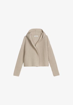 Cardigan en tricot beige à manches longues et col large, présentant un motif côtelé texturé et une ouverture frontale.