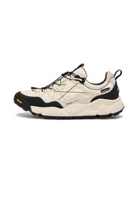 Sneakers impermeabili beige chiaro con accenti neri, tessuto testurizzato, suola sagomata e sistema di lacci elastici per una calzata sicura.