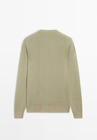 Lichtgroene gebreide trui met lange mouwen, ronde hals en geribde boorden bij de mouwen en zoom. Soepele textuur met een eenvoudig ontwerp.