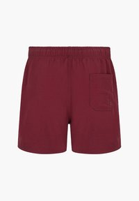 Bordowe szorty wykonane z miękkiego materiału, z elastycznym pasem, z pojedynczą kieszenią z tyłu i luźnym krojem.
