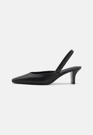 Black leather slingback pump with a pointed toe, slim heel, and smooth texture. Features minimalistic design with no adornments.