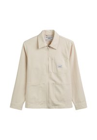 Beige katoen werkjack met een ritssluiting aan de voorkant, een puntige kraag en twee grote zakken aan de voorkant. Heeft een borstzak met een label.