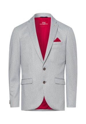 Lichtgrijze blazer van textuurtstof, voorzien van een rode binnenvoering, twee voorkruiszakken, twee bruine knopen en een borstzak met een rode zakdoek.