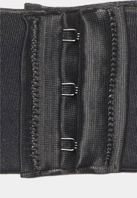 Black fabric band with hooks and eye closures, featuring textured material and stitching details, designed for adjustable fit.
