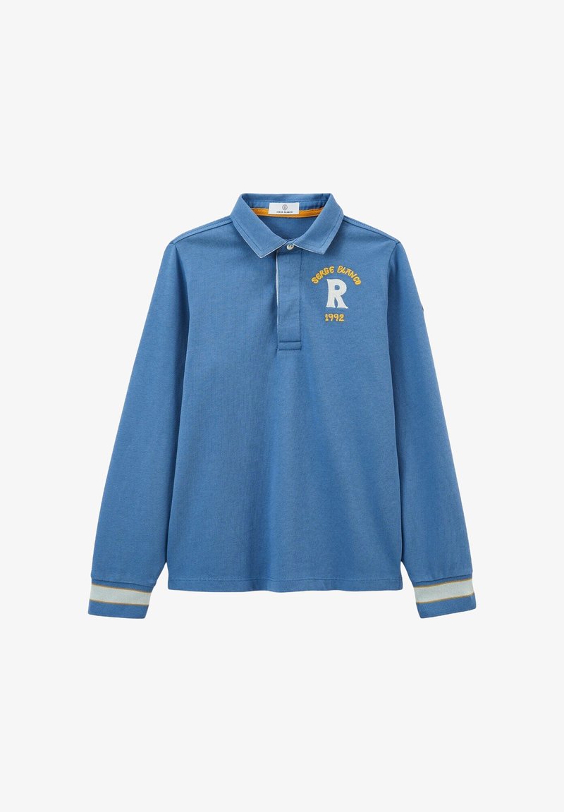 Polo bleu à manches longues avec col, présentant un logo brodé jaune et l'année '1992'. Décorations rayées sur les manches. Matière en coton.