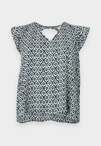 Mörkblå och vit mönstrad blus med V-ringning och små ärmar; geometrisk design och genomskinlig textur. Nyckelhålsdetalj bak.