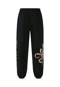 Schwarze Jogginghosen mit einem lässigen Schnitt, ausgestattet mit einem elastischen Bund, einer Seitentasche und bunten Schlangen- und Flügelgrafiken an einem Bein.