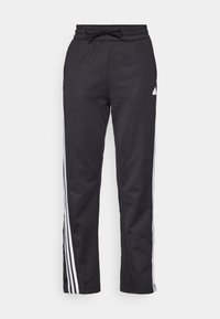 Svarta träningbyxor i slät tyg, med elastisk midja, dragsko och tre vita ränder längs sidorna.