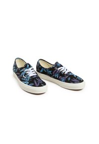 Black canvas sneakers featuring a colorful leaf pattern in blue and purple. White laces and rubber soles complete the design.