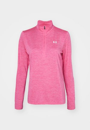 Pink long-sleeve quarter-zip pullover made from textured fabric, featuring a small white logo on the left chest and a mock collar.