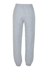 Pantalon de survêtement gris avec taille élastique et poignets. Fabriqué en tissu doux au toucher lisse. Design à jambe droite sans poches.