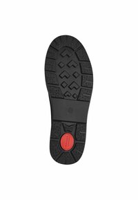 Semelle de chaussure en caoutchouc noir avec un motif de relief texturé. Comprend un insert de rembourrage rouge au centre. Indication de taille : 37.