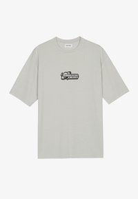 Light gray short-sleeve t-shirt made of soft cotton. Features a black graphic logo on the chest. Crew neck design with a relaxed fit.