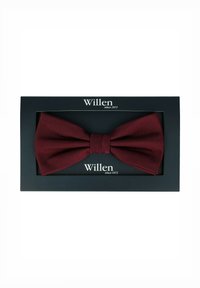 Bordeauxfarbige Fliege in einer rechteckigen Schachtel, mit glatter Textur und zentralem Knoten; die Verpackung trägt den Markennamen "Willen" prominent.