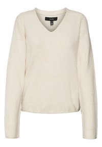 Jasnobeżowy sweter z dekoltem w serek wykonany z miękkiej, teksturowanej tkaniny, z długimi rękawami i luźnym krojem, z niedokończonym obszyciem.