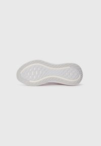 White athletic shoe sole with textured tread pattern against a plain white background, viewed from the bottom.