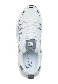 White athletic shoe with mesh and synthetic material, rounded toe, lace-up front, gray accents, and logo patch on tongue.