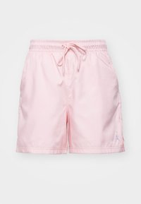 Ljust rosa träningsshorts med elastisk midjeväv, dragsko, sidofickor och liten broderad logotyp på vänster benkant.