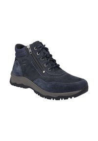 Scarpe mid-top in suede blu navy con zip laterale, design con lacci, accenti testurizzati e suola in gomma grigia robusta per una buona aderenza.