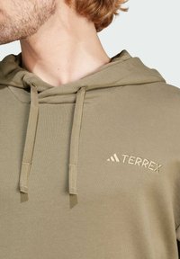 Adidas Terrex TX LOGO HOODY - Jersey con capucha - olive strata s
