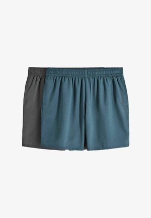 Dva páry šortiek s elastickým pásom, jedny tmavosivé a jedny modrozelené, zobrazené položene s bočnými vreckami.