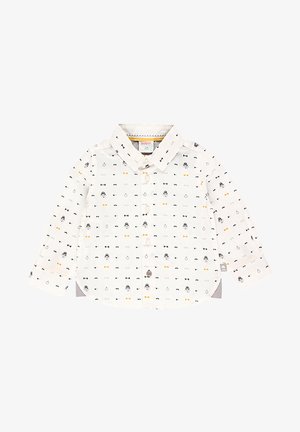 Chemise à boutons en tissu blanc avec un motif de nœuds papillon noirs et jaunes et de visages. Manches longues, ourlet arrondi et col.